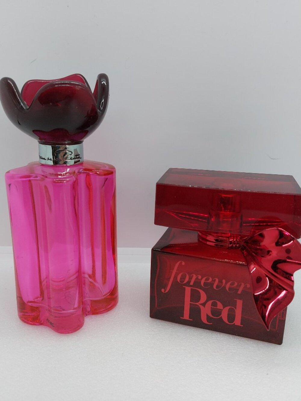 2 Empty Red & Pink Glass Perfume Bottles Oscar  De La Renta & Forever Red